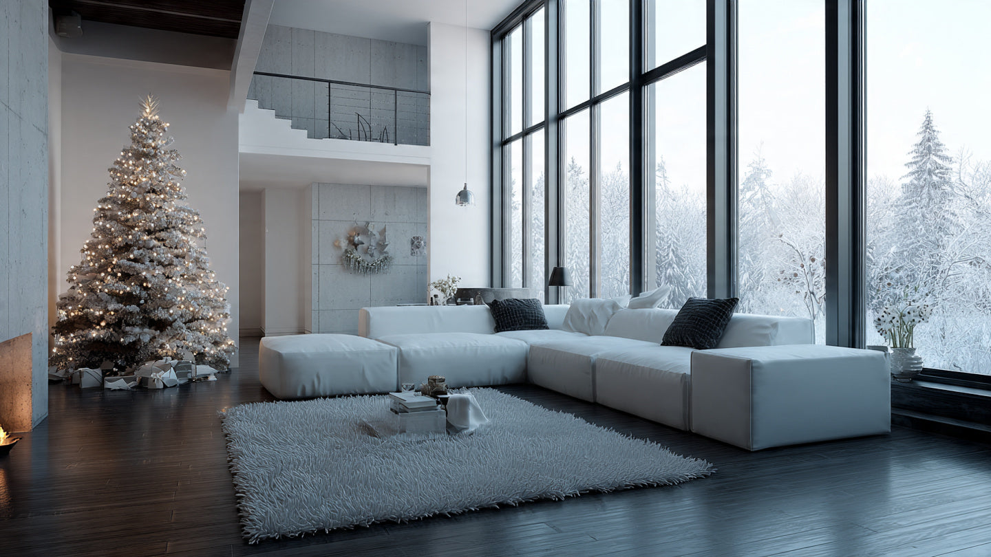 Cozy minimalist christmas living room with beige sofa throw blanket and neutral tree